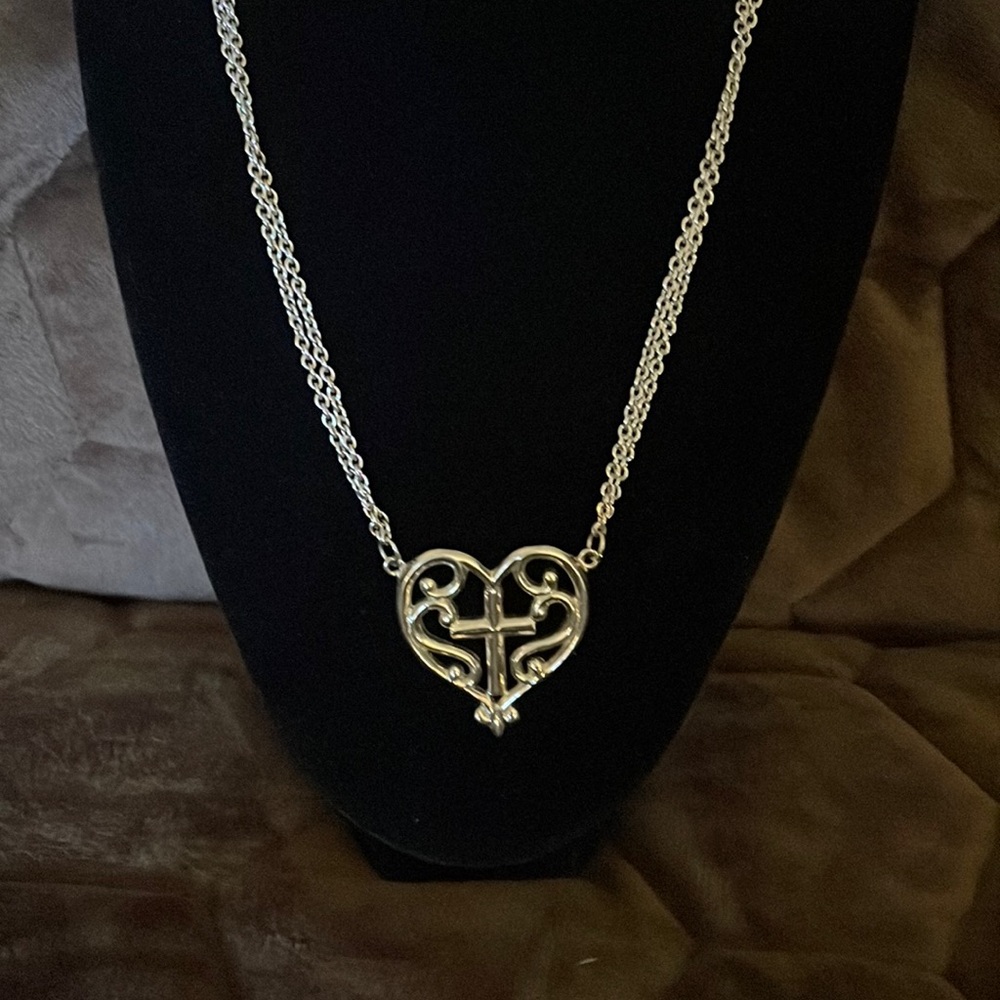 Silver tone heart shaped cross necklace